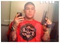 Aaron Hernandez selfie holding a gun
